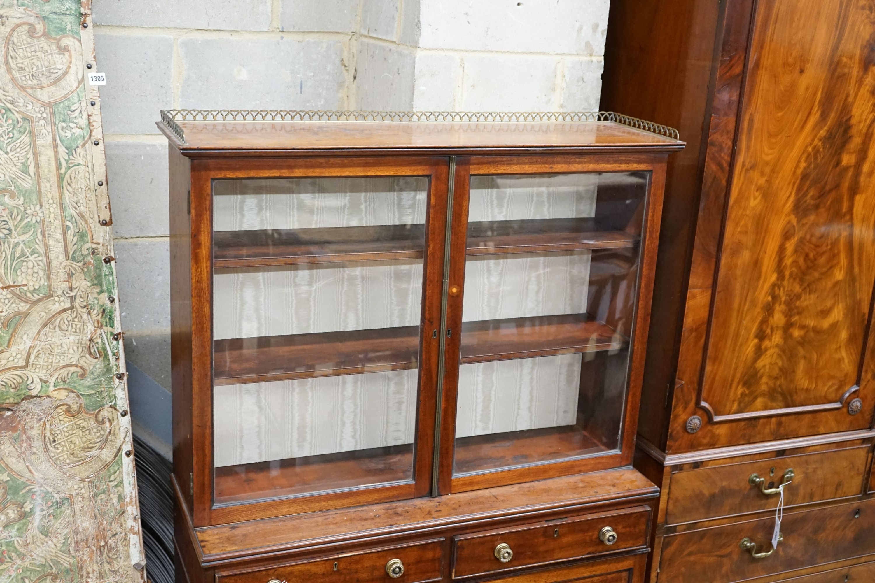 A small Regency glazed mahogany side cabinet, width 92cm, depth 33cm, height 147cm